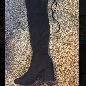 Black high heeled over the knee boots